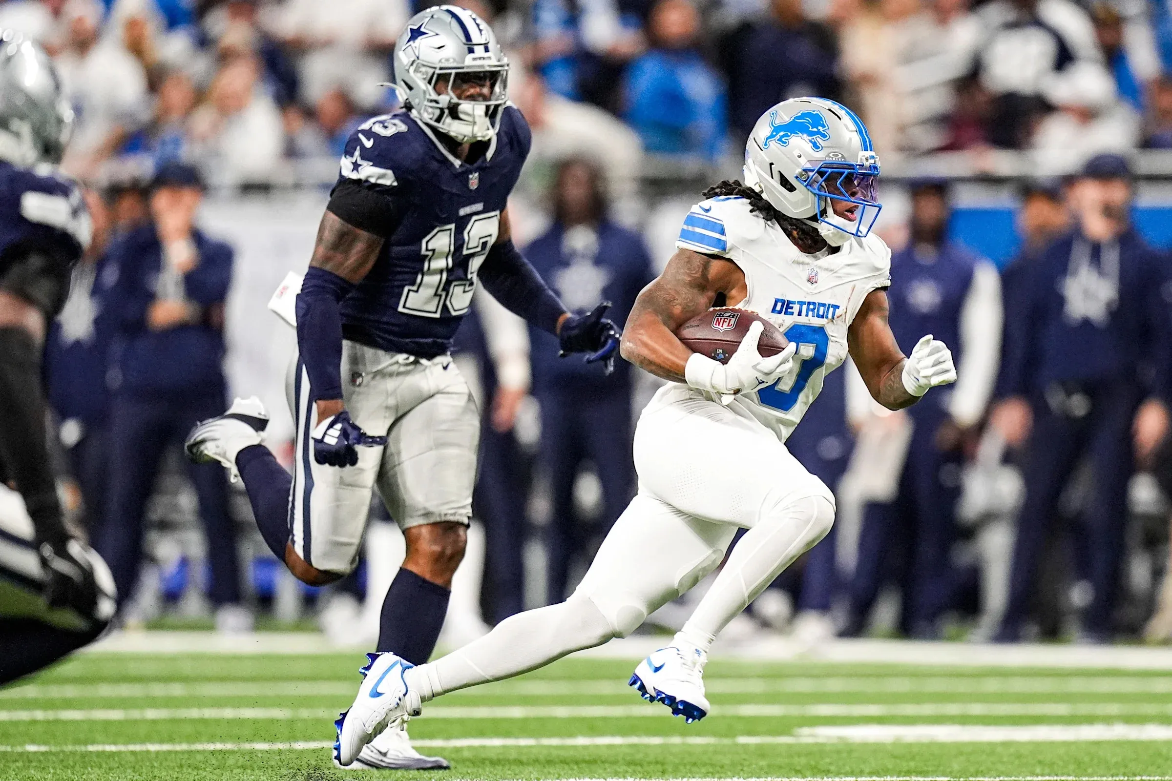Amon-Ra St. Brown leads Lions to 44-30 victory over Cowboys, boosting playoff chances