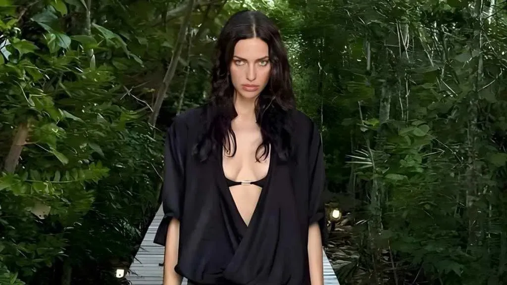 Irina Shayk Trades Bikinis for a Daring Look in Pool Photo