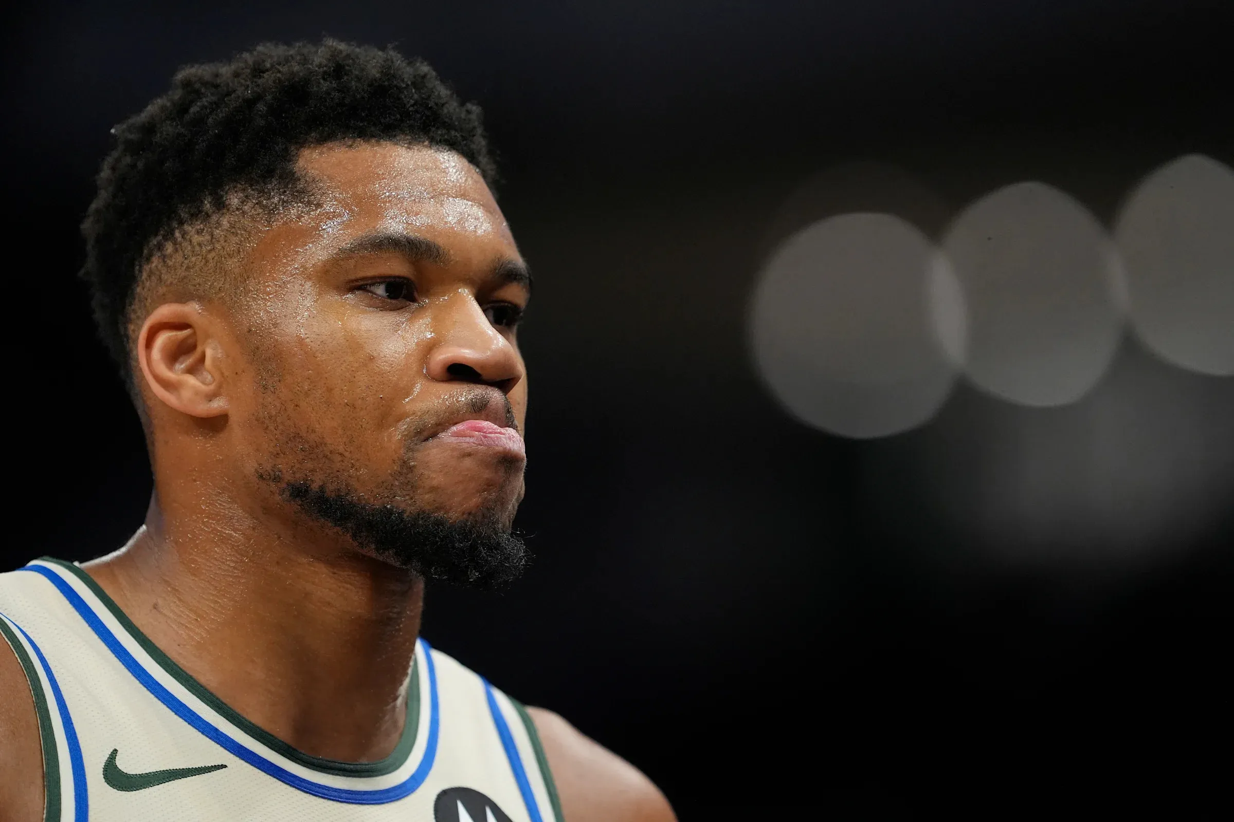 Giannis Antetokounmpo exits Bucks-Pistons game due to calf strain without contact