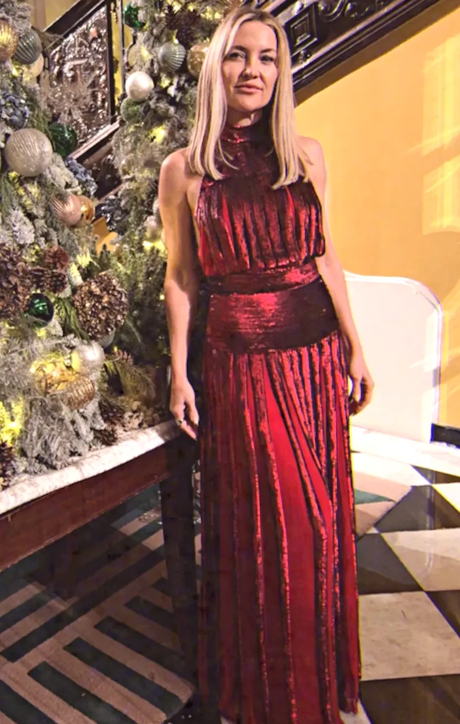 Kate Hudson Brings Festive Vibes in Stunning Red Velvet Gown