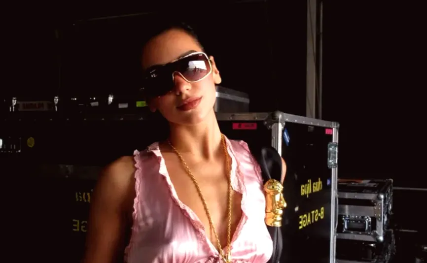 Dua Lipa's Pink Top Shows Off Her Toned Midriff and Steals the Spotlight