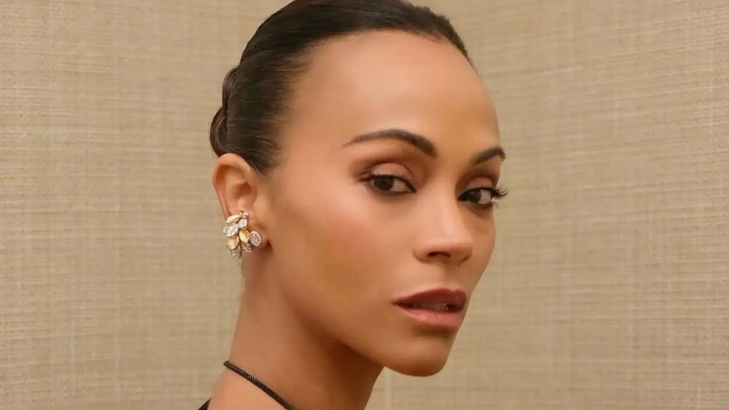 Zoe Saldaña's bodysuit with tattoo peek-a-boo sparks new off-duty fashion trend