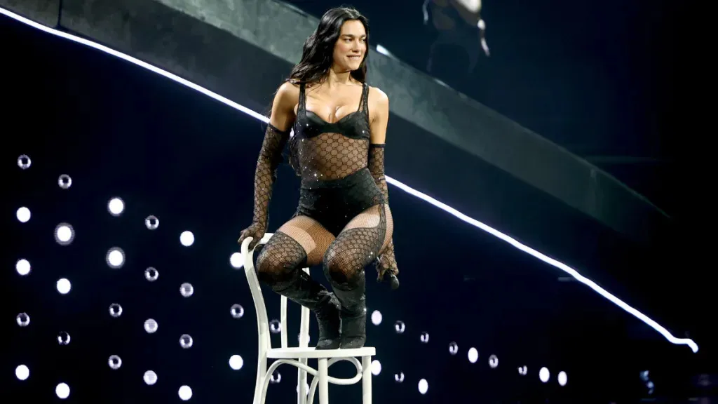 Dua Lipa's Black Minidress with Playful Cutouts