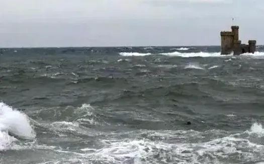 Caution about waves hitting coastal roads