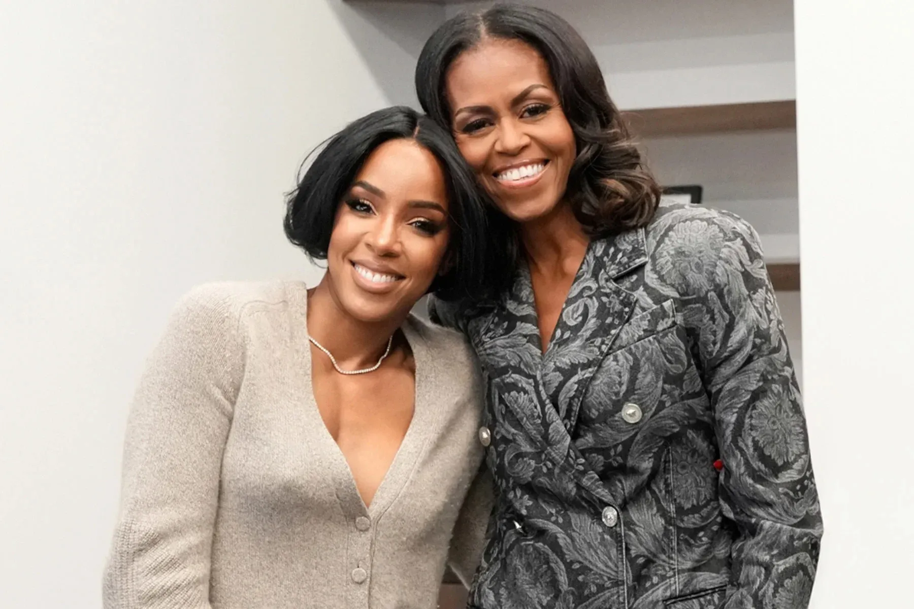 Michelle Obama and Michelle Williams photographed backstage at Brandy and Monica's Tour