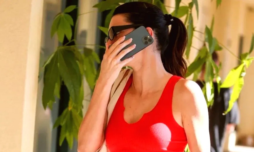 Kendall Jenner Celebrates Holiday Season in Red Dress with Dance