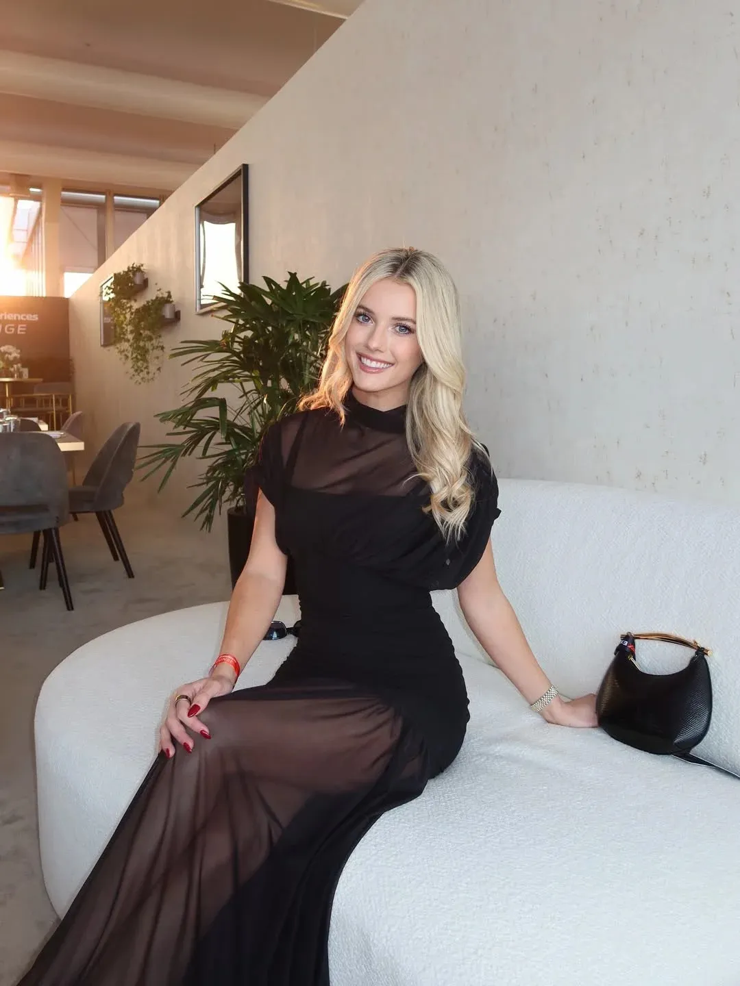 Race Car Driver Lindsay Brewer Stuns in a Sleek Black Gown at Qatar GP