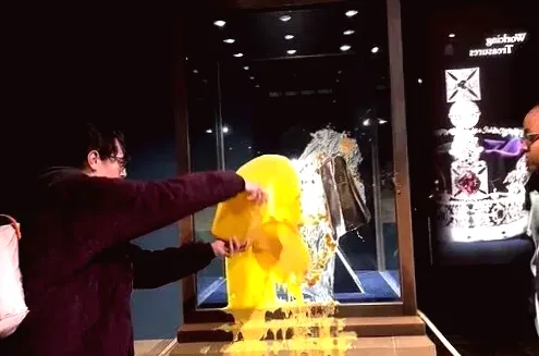 Activists vandalize Crown Jewels with 'crumble and custard' in protest of high taxes