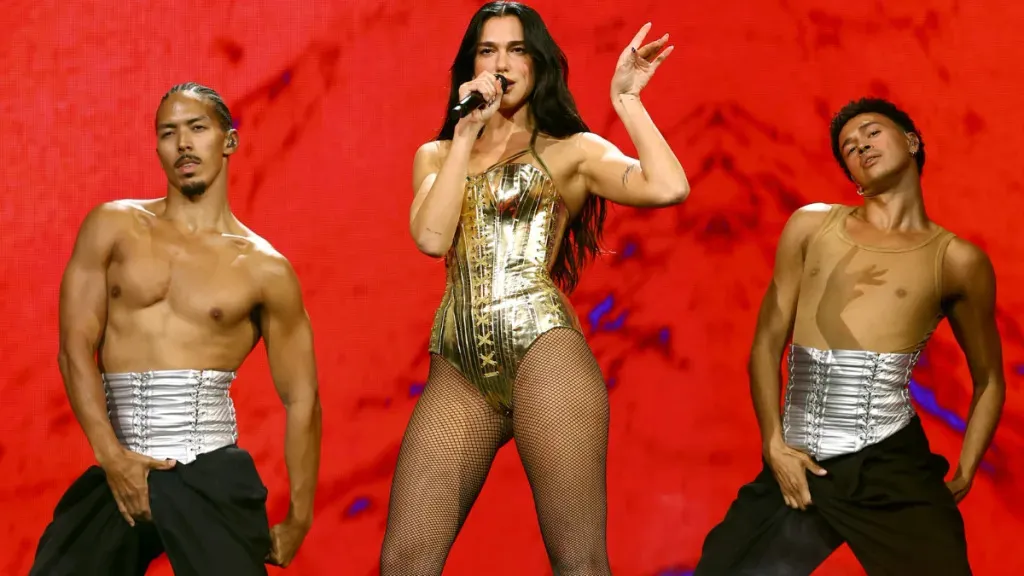Dua Lipa's Fans Declare Her the 'Hottest' in Gold Bodysuit