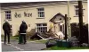 Bulldozer crashes into village pub during opening hours