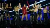 Dua Lipa's Red Bodysuit Secured Only by Belts