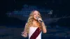 Mariah Carey Shines in Festive Candy Cane Dress to Start Christmas Season in Vegas