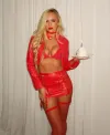 Celebrating Her 42nd Birthday in Fiery Red Leather: Ex-WWE Superstar Danielle Moinet