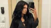 Kylie Jenner Rocks Low-Cut Black Dress for Thanksgiving