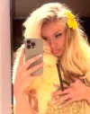 Swedish Singer Zara Larsson Shows Off Her Figure in Glittery Strapless Minidress