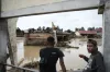 Scientists say Deadly Asian floods are not a coincidence, but a warning of climate change.